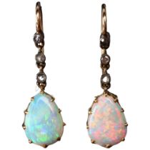 A pair of Edwardian opal and diamond drop earrings, the unmarked gold and silver settings with