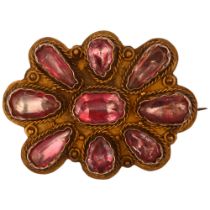 A Georgian foil-back pink topaz cluster brooch, circa 1820, unmarked gold closed-back settings, with