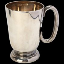 A George V silver pint mug, Walker & Hall, Sheffield 1927, tapered cylindrical form with C-shaped