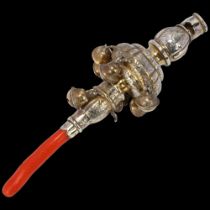 A late Victorian silver-gilt coral baby's rattle, George Unite, Birmingham 1898, with whistle and