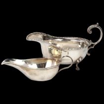 An Edwardian silver sauce boat, and a French silver pap boat, largest length 16cm, 5.3oz total (2)