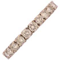 A diamond full eternity ring, unmarked white metal settings with modern round brilliant-cut