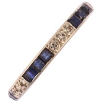 An Art Deco sapphire and diamond full eternity ring, unmarked white metal settings with calibre-