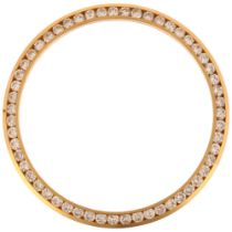 A Custom yellow gold diamond watch bezel, bezel set with modern round brilliant-cut diamonds,