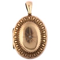 A Victorian diamond locket pendant, circa 1890, unmarked rose metal settings with central star set