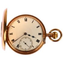 An early 20th century 9ct rose gold half hunter keyless side-wind pocket watch, white enamel dial