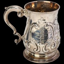 A George III silver pint beer mug, Fuller White London 1762, baluster form with relief embossed