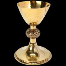 A large Arts and Crafts silver-gilt communion chalice, attributed to Edward Spencer for the