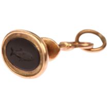 A Georgian miniature fish intaglio seal fob, in unmarked rose gold frame set with oval flat-top