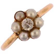 A mid-20th century pearl and diamond flowerhead cluster ring, unmarked gold settings with central