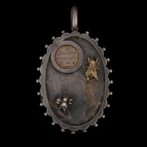 A Victorian silver 'Ye spider and ye flie' nursery rhyme photo locket pendant, maker H&M, circa