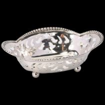 TIFFANY & CO - an American sterling silver dressing table dish, lobed quatrefoil form, with beaded