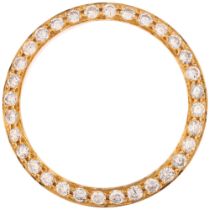 A Custom yellow gold diamond watch bezel, pave set with modern round brilliant-cut diamonds, total