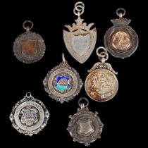 7 early 20th century silver sporting presentation medals, including Football League winners etc,