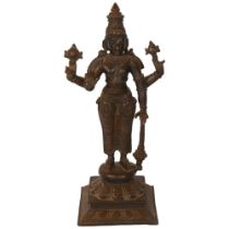 A bronze sculpture of Indian deity Vishnu, on a stand with lotus leaf decoration, H31cm