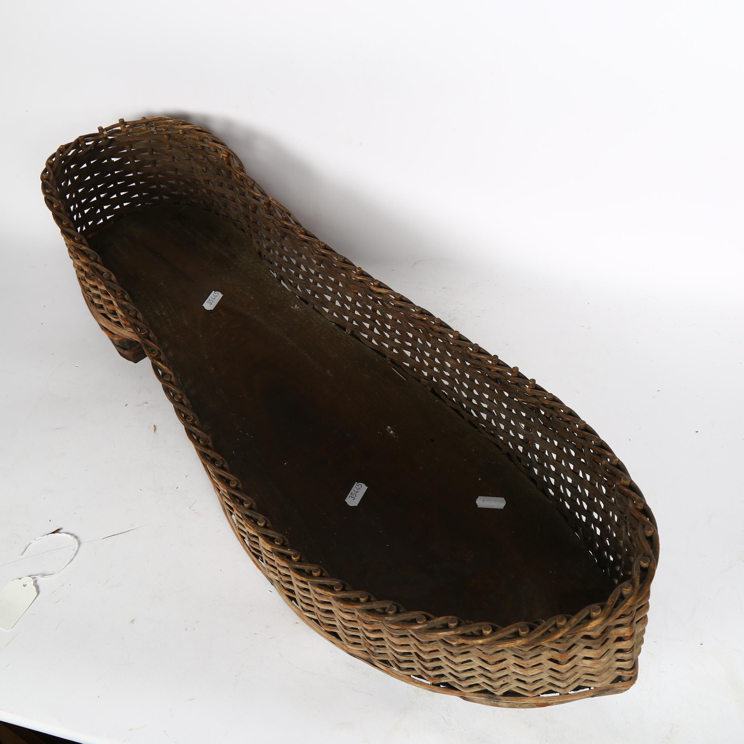 An unusual shoe shape wicker basket, L70cm - Image 2 of 2