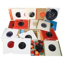 A quantity of 7" vinyl records, including various artists such as The Beatles, The Rolling Stones,