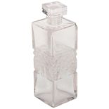 R LALIQUE FRANCE - a rectangular scent bottle and stopper, having a moulded child and tree design