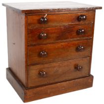 Vintage stained pine collector's chest of 4 long drawers, with turned wood handles, H31.5cm, W30.5cm