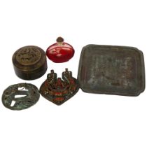 A Chinese red overlay glass scent bottle, a circular horn box with carved decoration, a bronze suba,