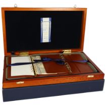 A limited edition leather Filofax, in original wooden case, and cardboard box