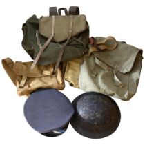 Second World War helmet, canvas bags, rucksack, and a German military cap