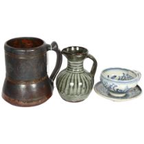 3 pieces of Studio pottery, Seth Cardew cup and saucer and a large Abuja pottery tankard, both