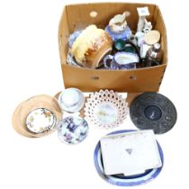 A box of decorative china, and a cocktail shaker