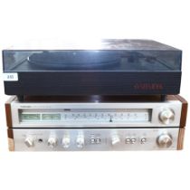 A Systemdek II turntable, and a Toshiba stereo receiver, model SA-320L, comes with purchase