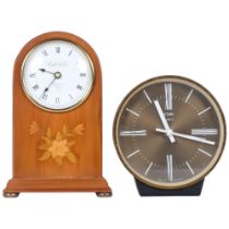 Knight & Gibbins, London, a domed top quartz mantle clock and a metamec quartz mantle clock, West