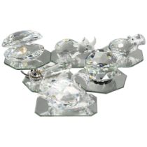 4 Swarovski crystal glass ornaments, including hippo, rhinoceros, and a swan, etc, all on separate