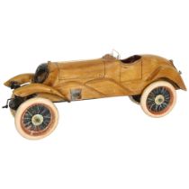 Clive Fredriksson, stylised carved and polished wood study of a Vintage motorcar, L42cm