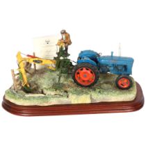 Border Fine Arts sculpture, depicting a man with digger and tractor, on wooden plinth, limited