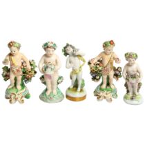 A group of 19th century figurines, cherub figures with floral baskets and garlands, largest height