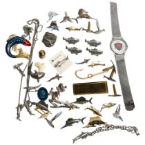 A group of fishing themed costume jewellery, cufflinks, etc, including some silver items