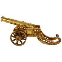 A heavy cast-brass table cannon, L43cm overall