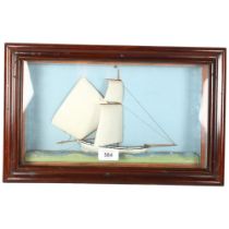 A diorama depicting a sailing boat, in glazed case, 26 x 41cm