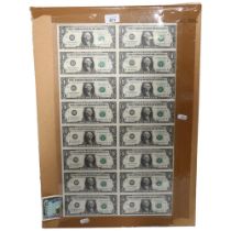 An uncut sheet of American one dollar bills