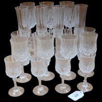 A suite of 22 Eclat Longchamp crystal glassware, including 4 Champagne flutes, H20cm