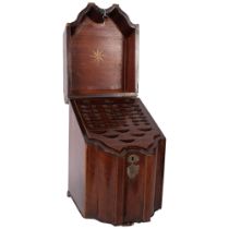 A George III mahogany and satinwood-banded knife box, of shaped form, with later converted interior,