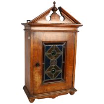 Edwardian oak table-top cabinet, with shelf and drawer-fitted interior, and stained glass panel to