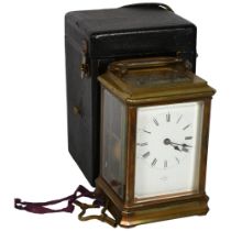 A 19th century French brass-cased carriage clock, 8-day striking movement, with enamel dial and
