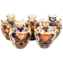 A group of 5 x 19th century Derby and Imari decorated 2-handled pots, h8cm