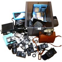 A quantity of various cameras and equipment, including a Pentax Auto 110, with associated lens and