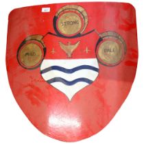 A shield-shaped painted aluminium bar plaque, H61cm