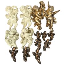 A group of various plaster cast wall-hanging cherubs, largest 29cm (14)