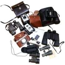 A quantity of Vintage cameras and binoculars, including a Kodak Brownie Reflex 20, a Kodak Brownie