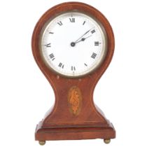Am Edwardian mahogany and shell marquetry decorated balloon cased mantel clock, white enamel dial