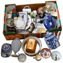A large quantity of mixed Oriental and other ceramics, including a blue and white egg chicken,