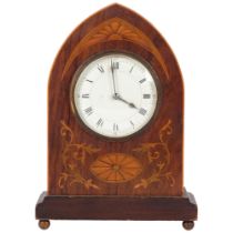An inlaid mahogany clock with curved top and French 8-day movement, H24cm